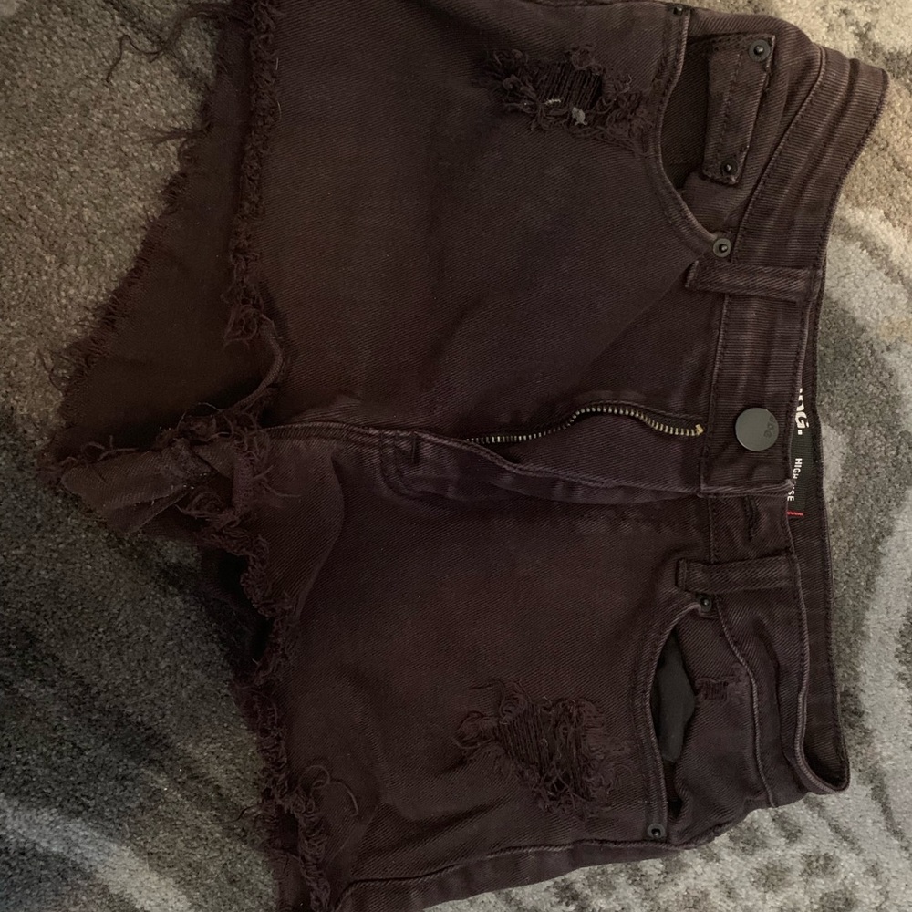 black ripped shorts
